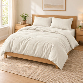 Ivory embossed microfiber bed sheet set with duvet cover, fitted sheet, and matching pillowcases