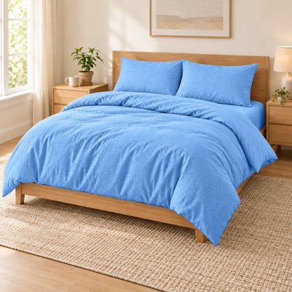 Light Blue embossed microfiber bed sheet set with duvet cover, fitted sheet, and matching pillowcases